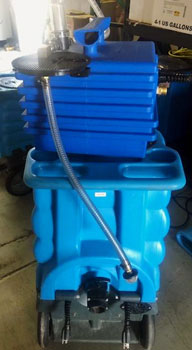 automatic drain and dump for tile cleaning
